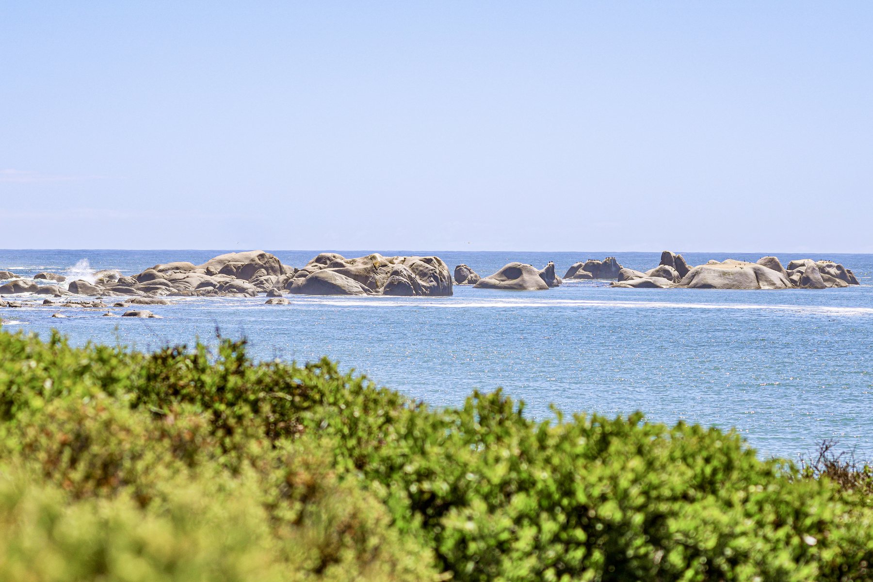 Granite boulders in the bay at Paternoster on a clear day