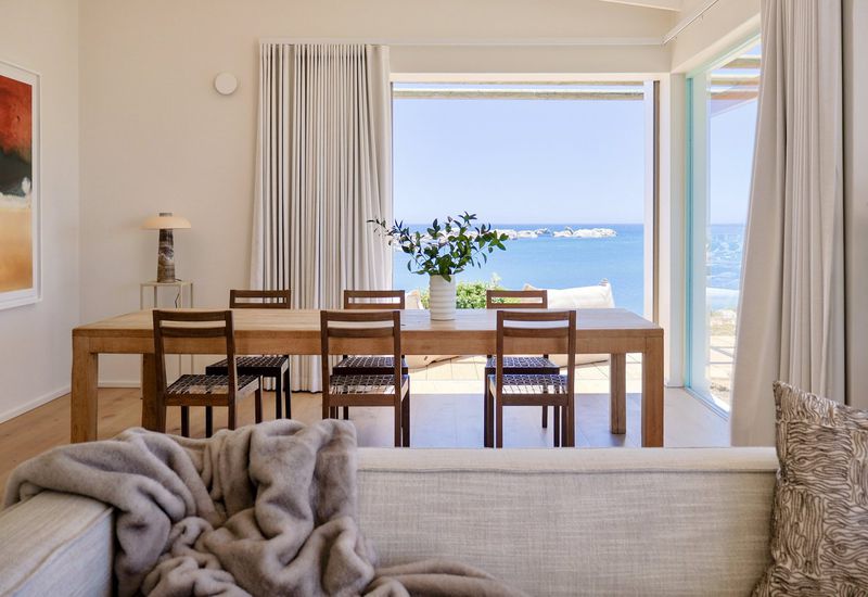 BURI House — dining table with the bay beyond